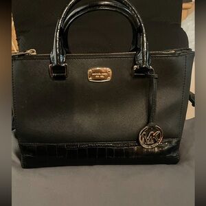 Very good condition authentic hand black mk purse